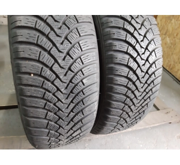 Качественные шины бу:  Falken EuroWinter HS 01 ../, шины б у R 16 фото