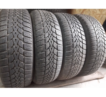 Качественные шины бу:  Dunlop Winter Response 2 ../., шины б у R 15 фото