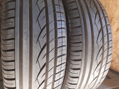 Шини на авто в хорошому стані Continental ContiPremiumContact шириною 235 висотою 65 радіусом R 17 низькі ціни