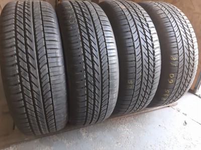 Шини на авто в хорошому стані GoodYear Eagle F1 AT  шириною 235 висотою 60 радіусом R 18 низькі ціни