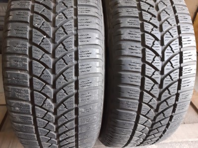 Шини на авто в хорошому стані Bridgestone Blizzak LM-18   шириною 235 висотою 60 радіусом R 16 низькі ціни