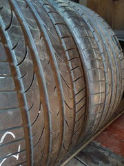 Качественные шины бу:  Bridgestone Potenza RE 050, шины б у R 19 фото